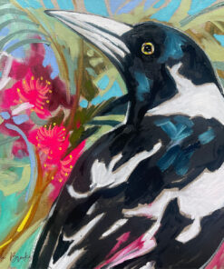 Lilli Rock Magpie Flowering Gum Magnet - A close-up painted portrait of a black-and-white bird with a long pale beak and yellow eye, set against a colourful background with pink flowers and blue-green foliage.